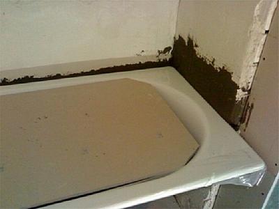 Как заделать стык между ванной и стеной Как заделать стык между ванной и стеной